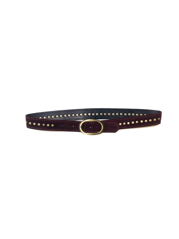 Dark burgundy suede belt with two rows of brass studs and an oval brass buckle. Reverse side is dark blue.