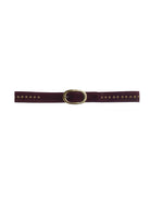 Dark red suede belt with an oval brass buckle and brass studs.