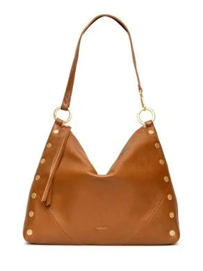 Brown leather hobo bag with single strap, gold O-rings, and gold studs down sides. Red lining visible.
