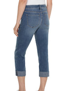 Medium blue cropped jeans with rolled hems, belt loops, and visible back patch pockets.