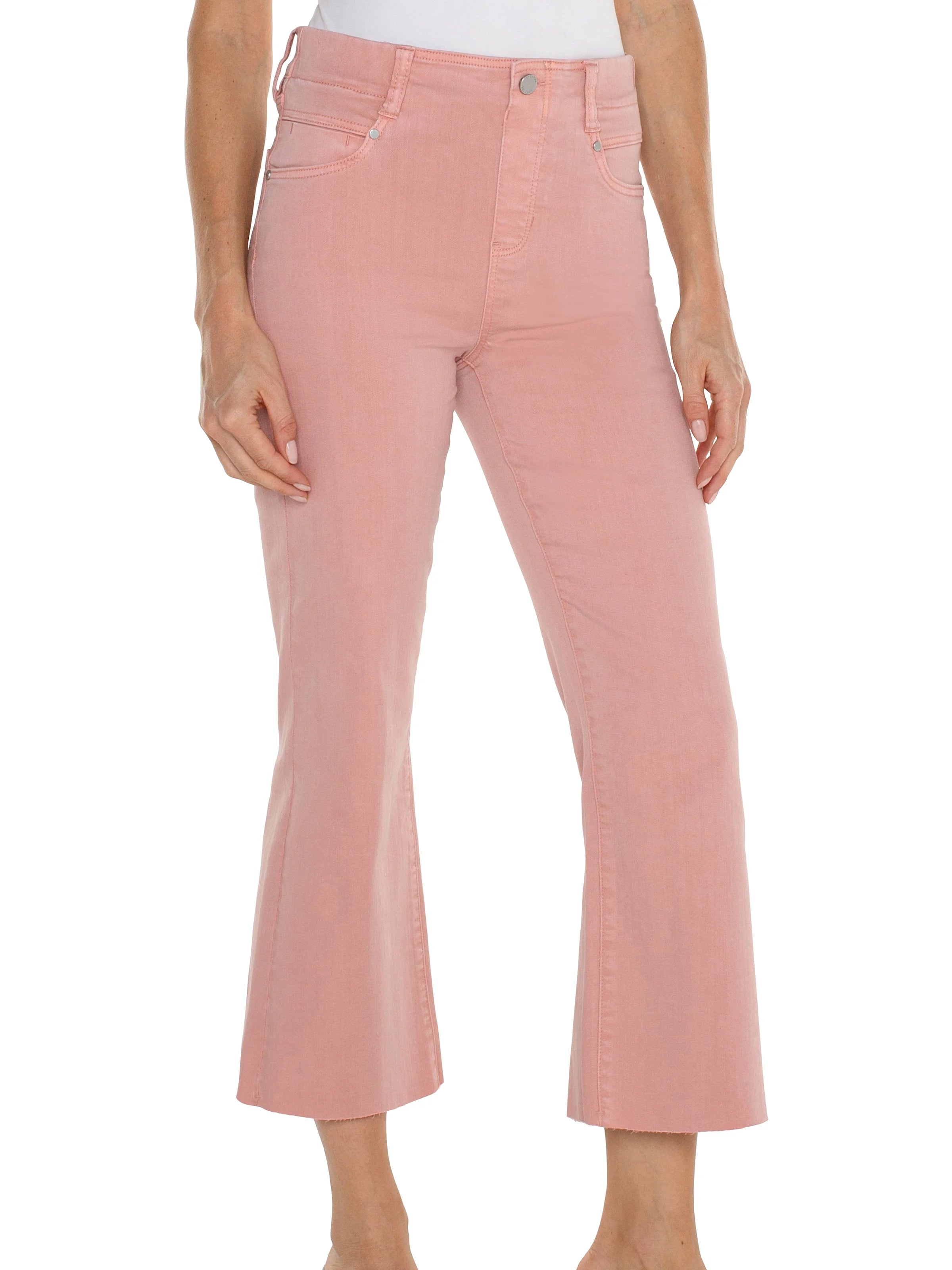 Dusty rose-colored cropped flare jeans; mid-rise waist, five-pocket styling.