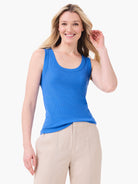 Blue ribbed knit scoop neck tank top on a model.