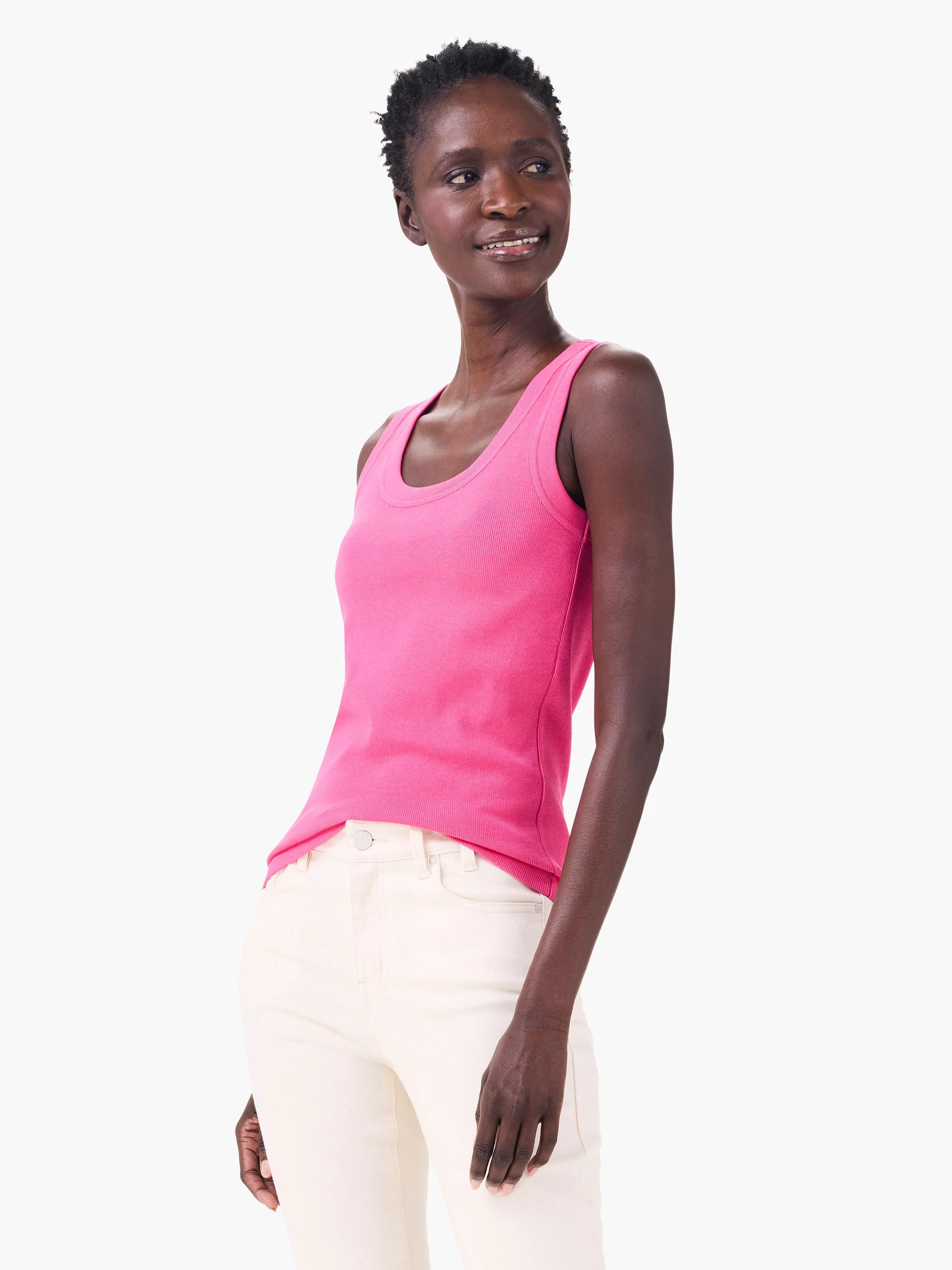 Bright pink ribbed scoop neck tank top on a model.
