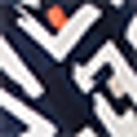 Navy blue woven fabric with white angular patterns and a small orange dot.