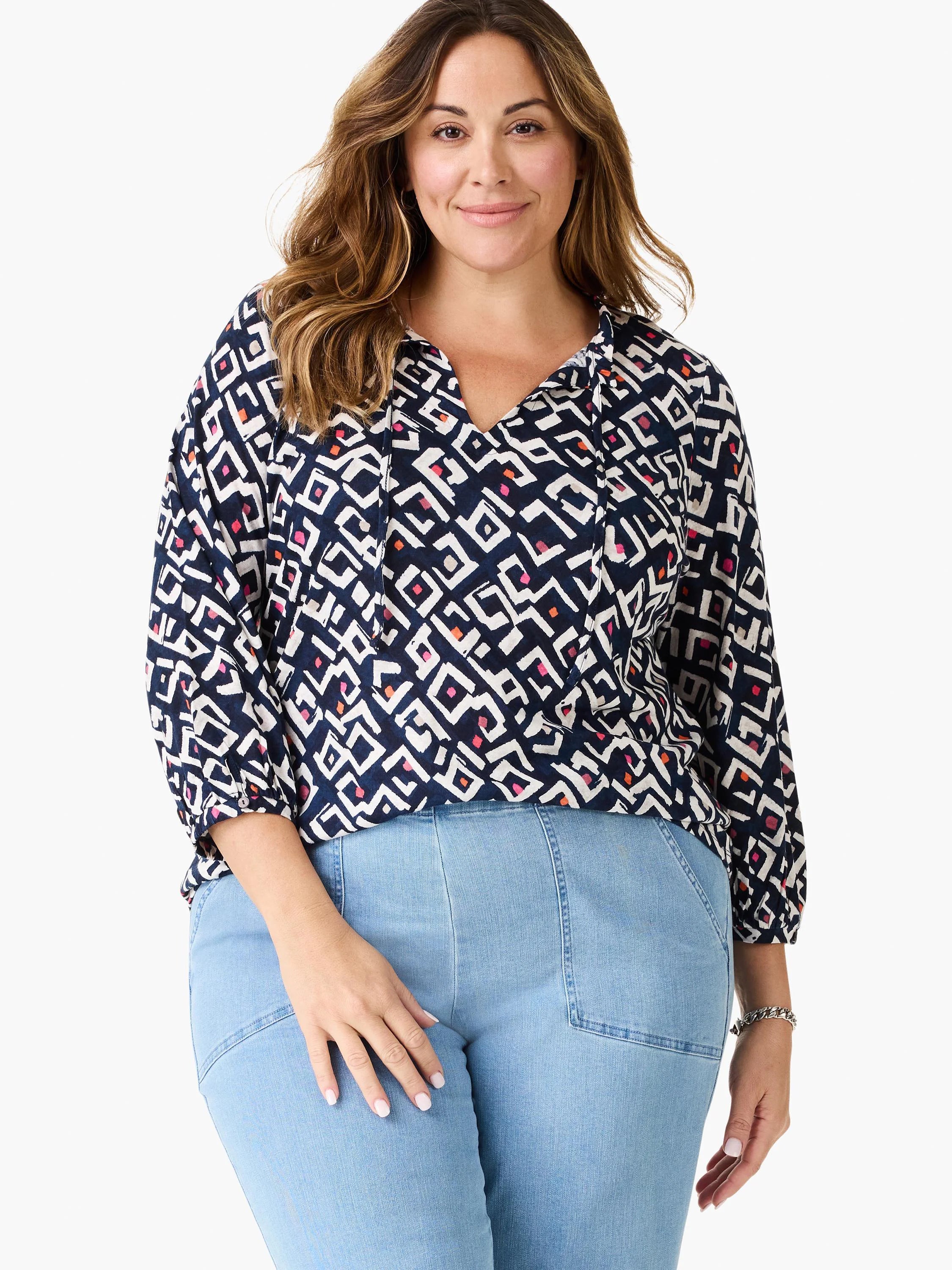 Top features indigo, white, pink, and orange geometric pattern, V-neck with ties, and 3/4 sleeves.