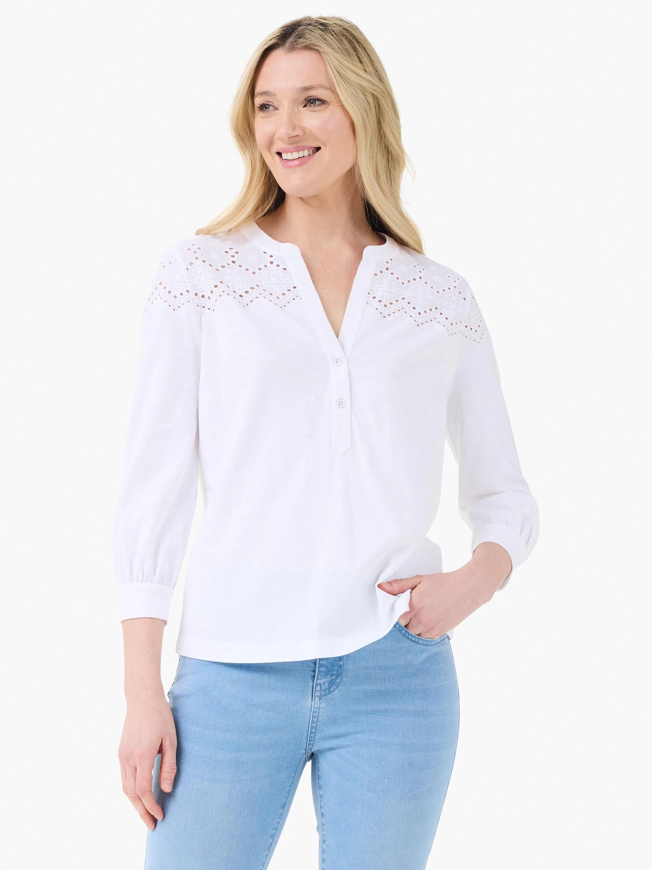 White top with eyelet lace yoke, V-neck, 2-button placket, and 3/4 sleeves.