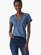 Blue henley top with rolled short sleeves, multi-colored neckline trim, and two chest pockets.