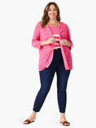 Fuchsia open cardigan with 3/4 sleeves, a light, sheer texture, and draped front.
