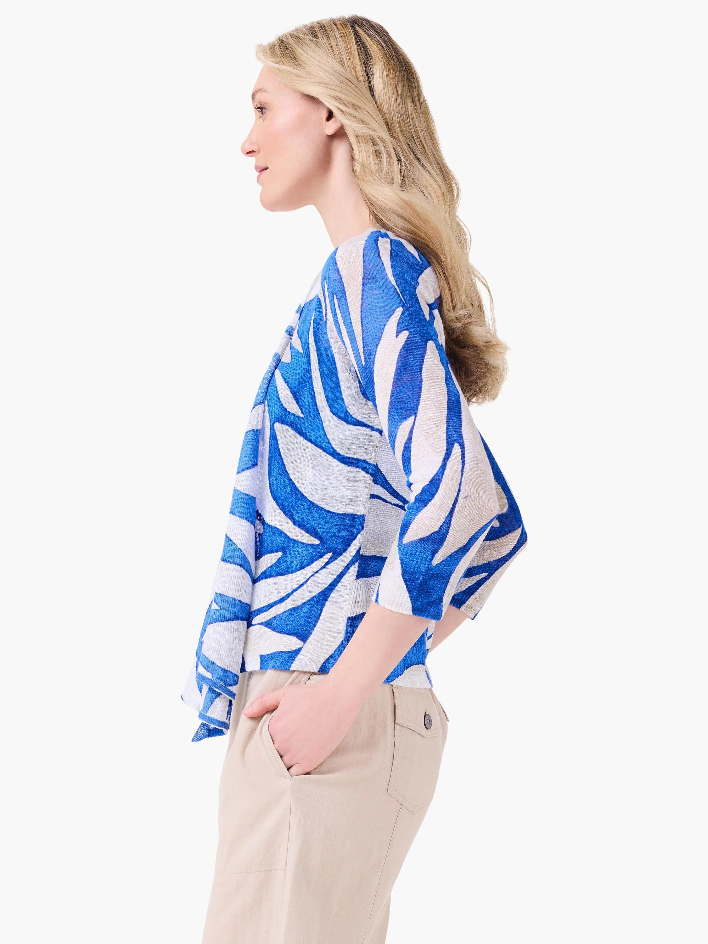 Meadow Mix Cardigan: blue and white organic pattern, 3/4 sleeves, worn open.