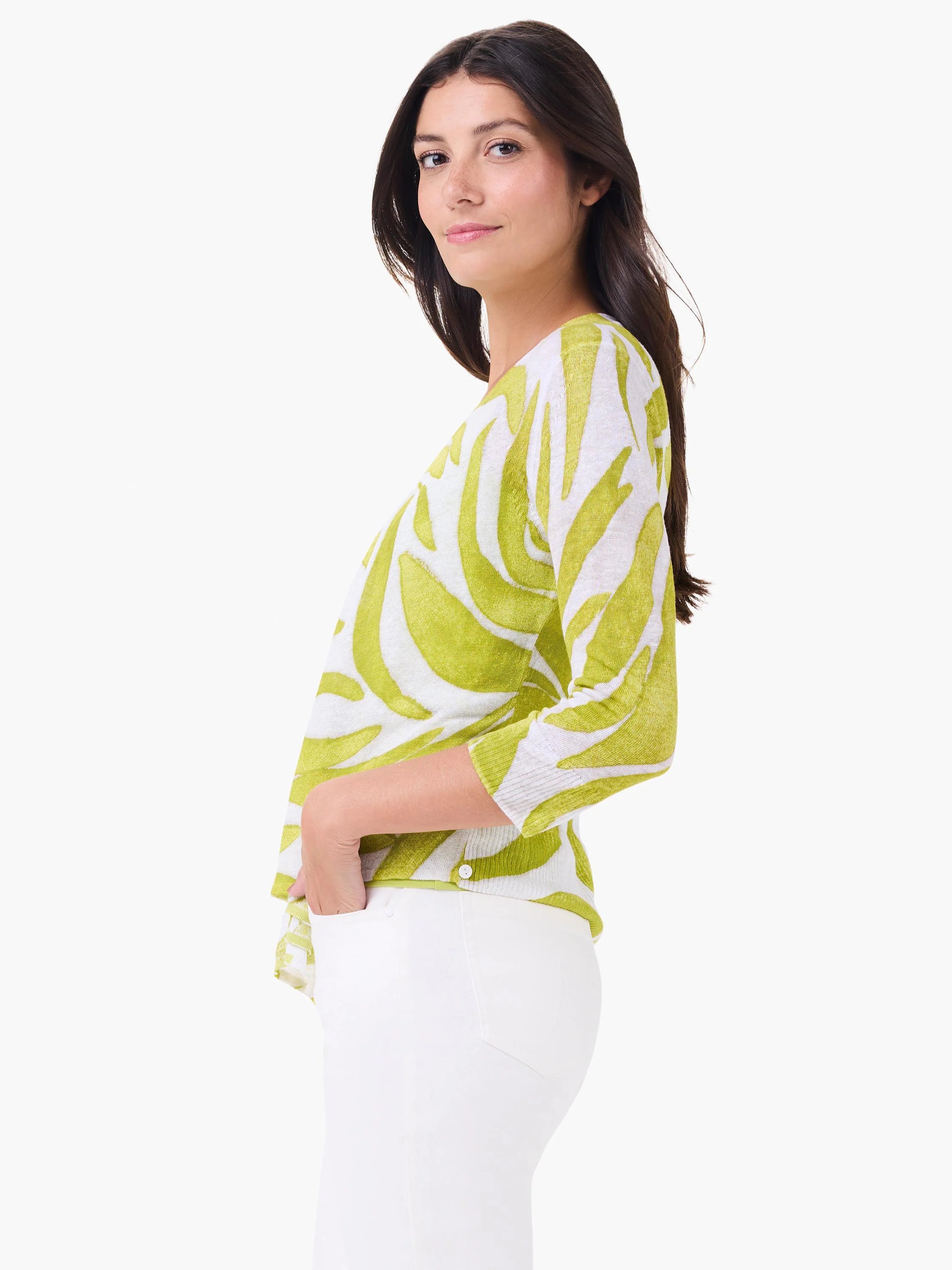 White and lime green abstract patterned cardigan with 3/4 sleeves and a single bottom button.