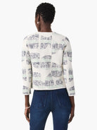 Cream knit jacket with textured navy and sage green abstract circle & square pattern, cropped length, 3/4 sleeves.