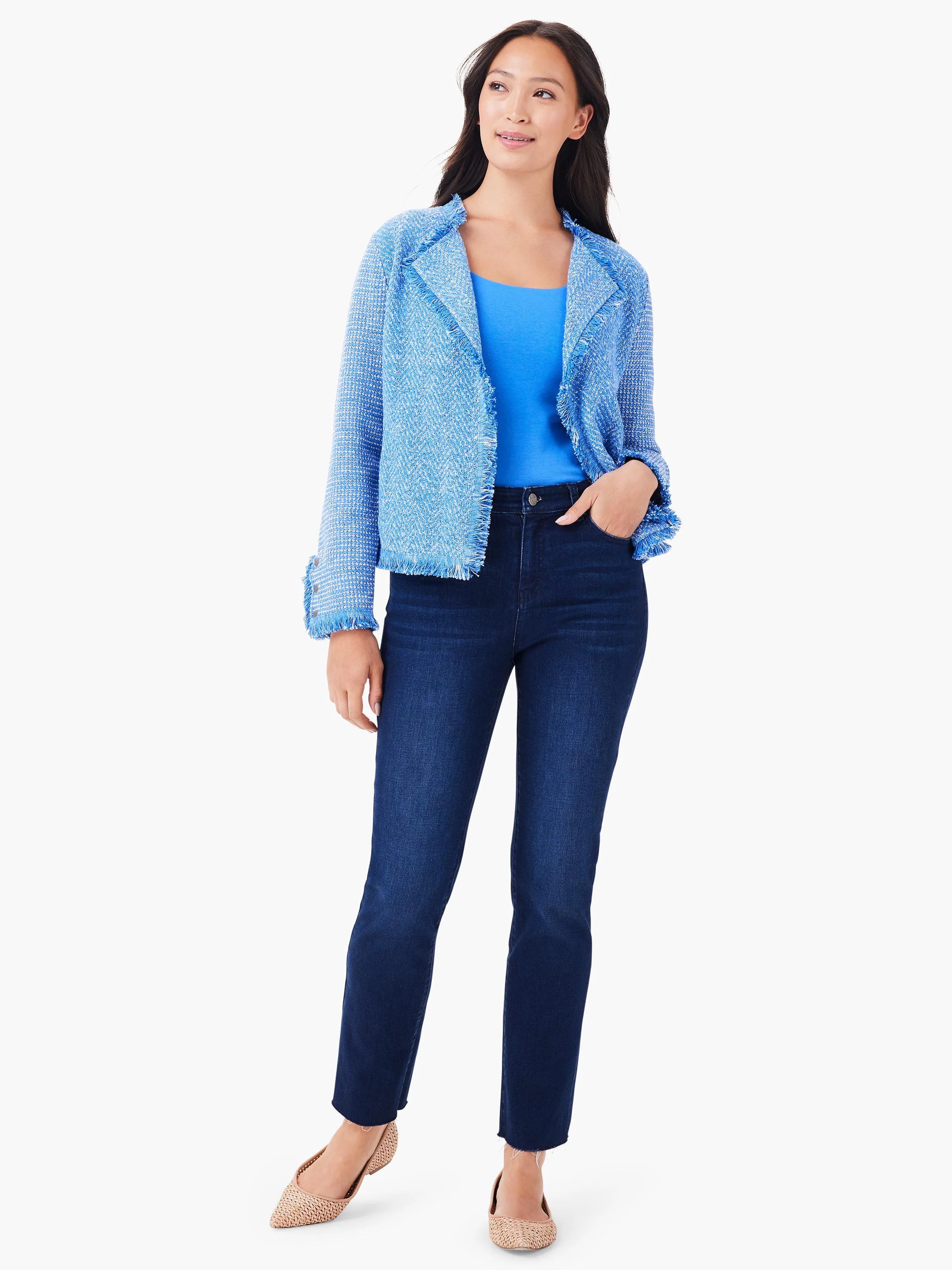Bright blue textured mix knit jacket with fringe along lapels, hem, and cuffs.