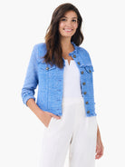 Blue mix knit jacket with herringbone texture, fringe trim at collar, pockets, and cuffs. Dark metallic buttons.