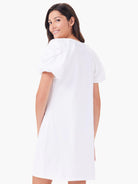White T-shirt dress with voluminous, embroidered short sleeves. Loose, above-knee fit.