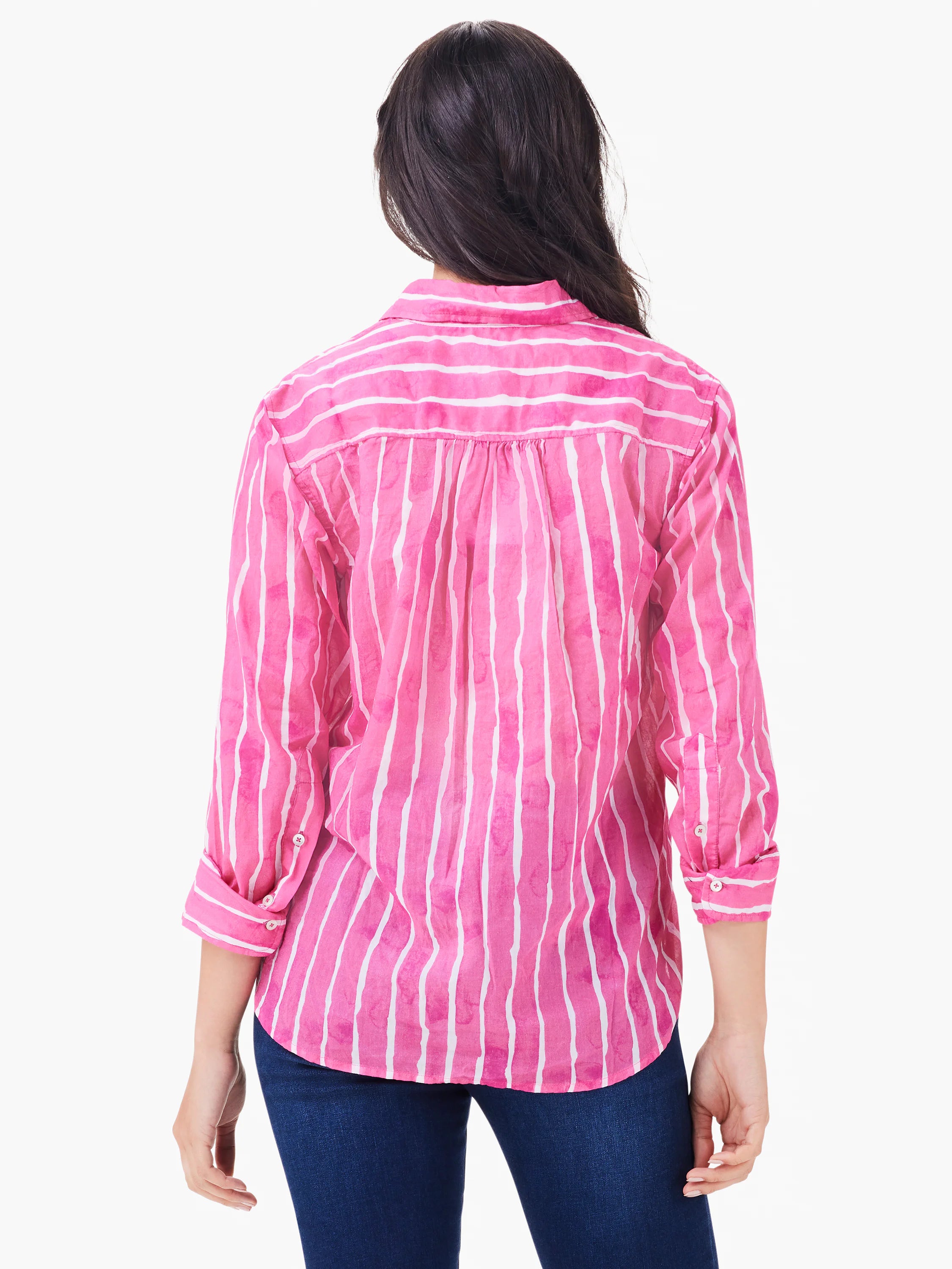 Pink and white watercolor stripe shirt, back view with rolled sleeves.
