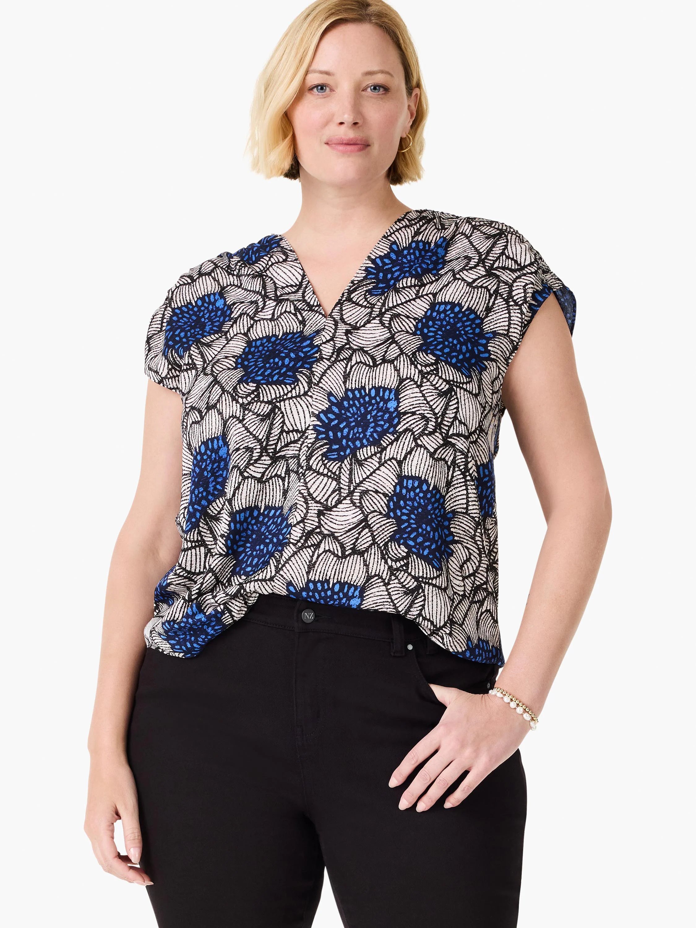 Blue, white, and black floral print V-neck top with short sleeves.