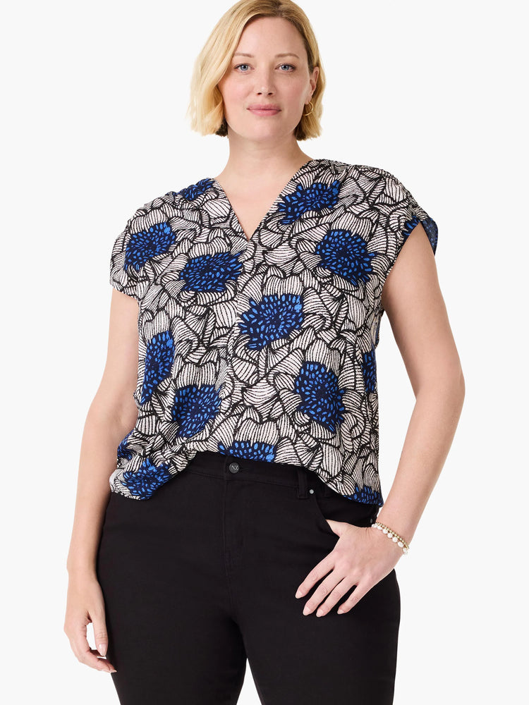 Blue, white, and black floral print V-neck top with short sleeves.