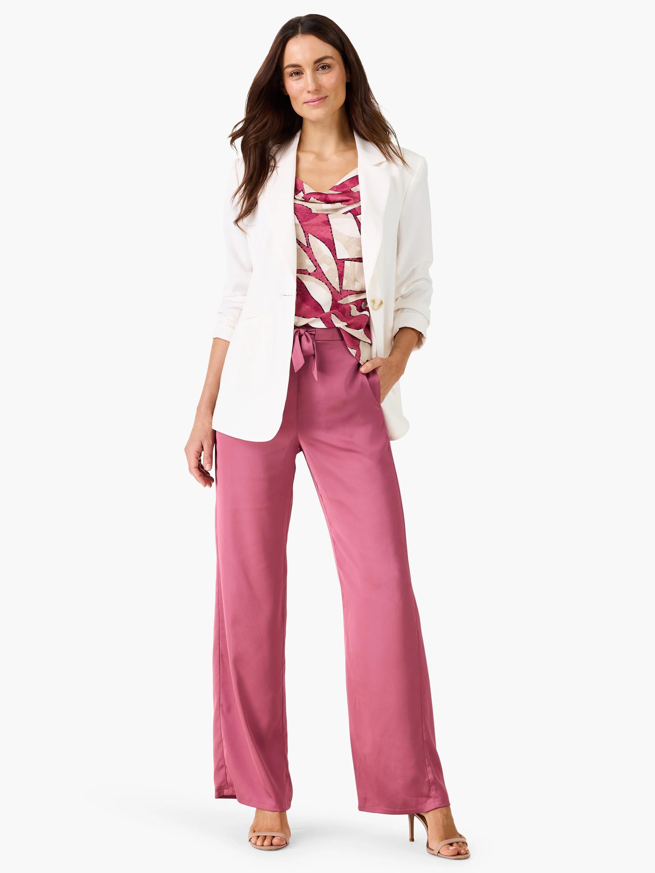 Sleeveless V-neck tank with an abstract pattern of magenta and cream block shapes.