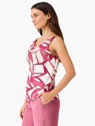 Cowl neck tank with berry and cream abstract block pattern.