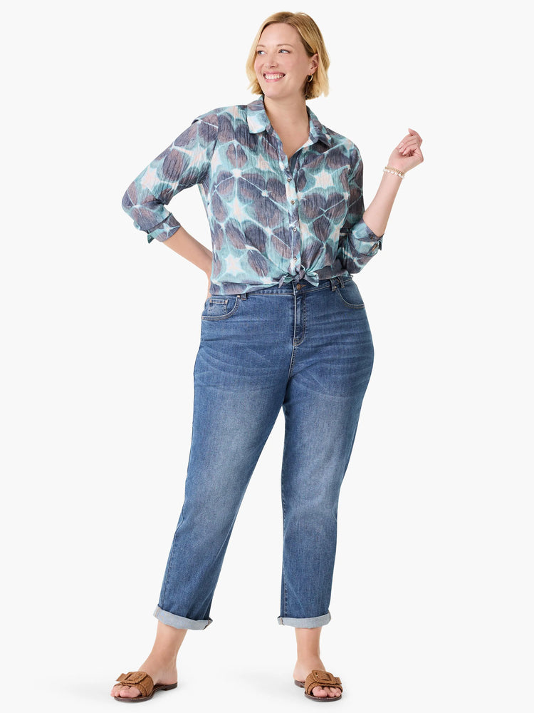 Crinkle button-up shirt with a swirling pattern in shades of aqua, teal, and dark blue.