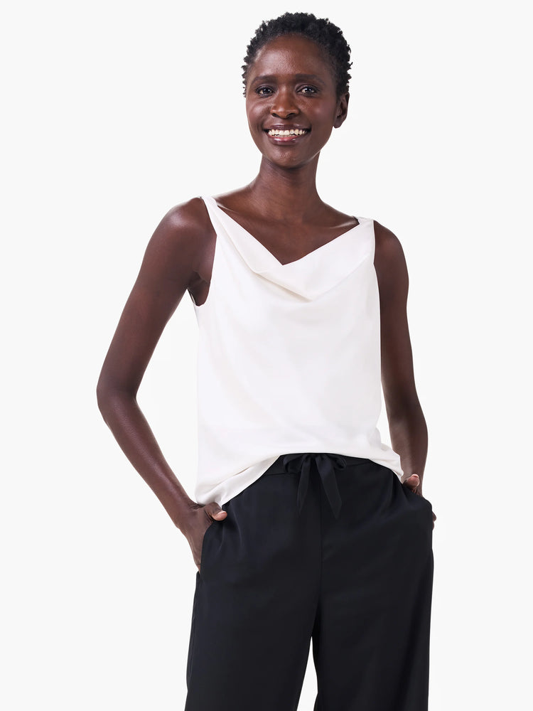 Off-white sleeveless tank top with a draped cowl neck and thin straps.
