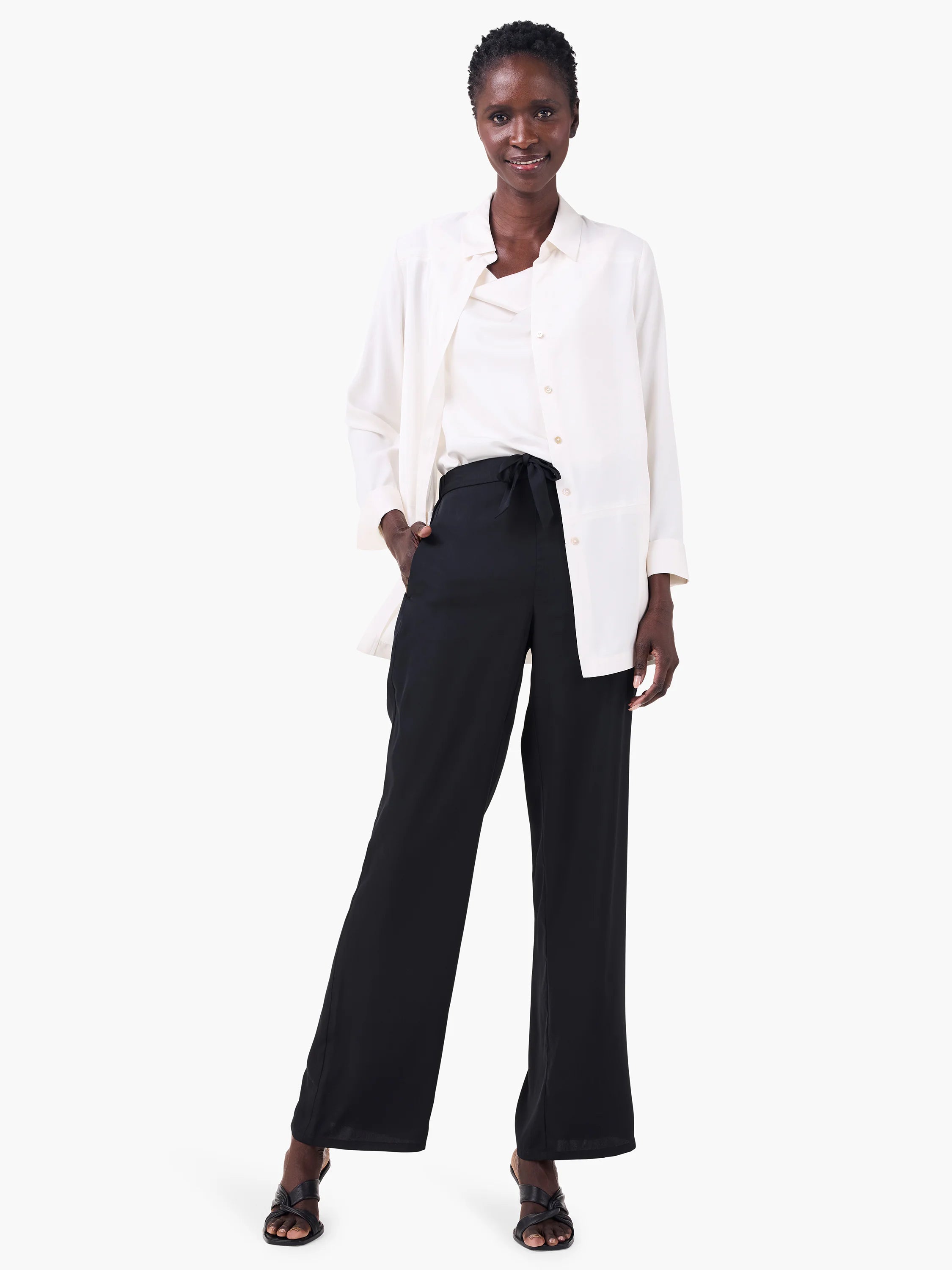 Off-white crepe drape tank with a soft draped neckline.