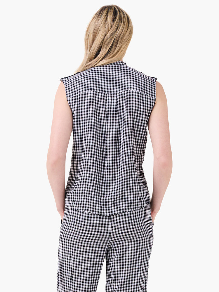 Black & white gingham sleeveless tank, back view, high neck, with a loose, drapey fit.