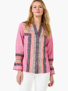 Pink "Spotty Stripes Top" with mixed diagonal stripes on sleeves & vertical patterned panels in navy, peach, and cream dots.