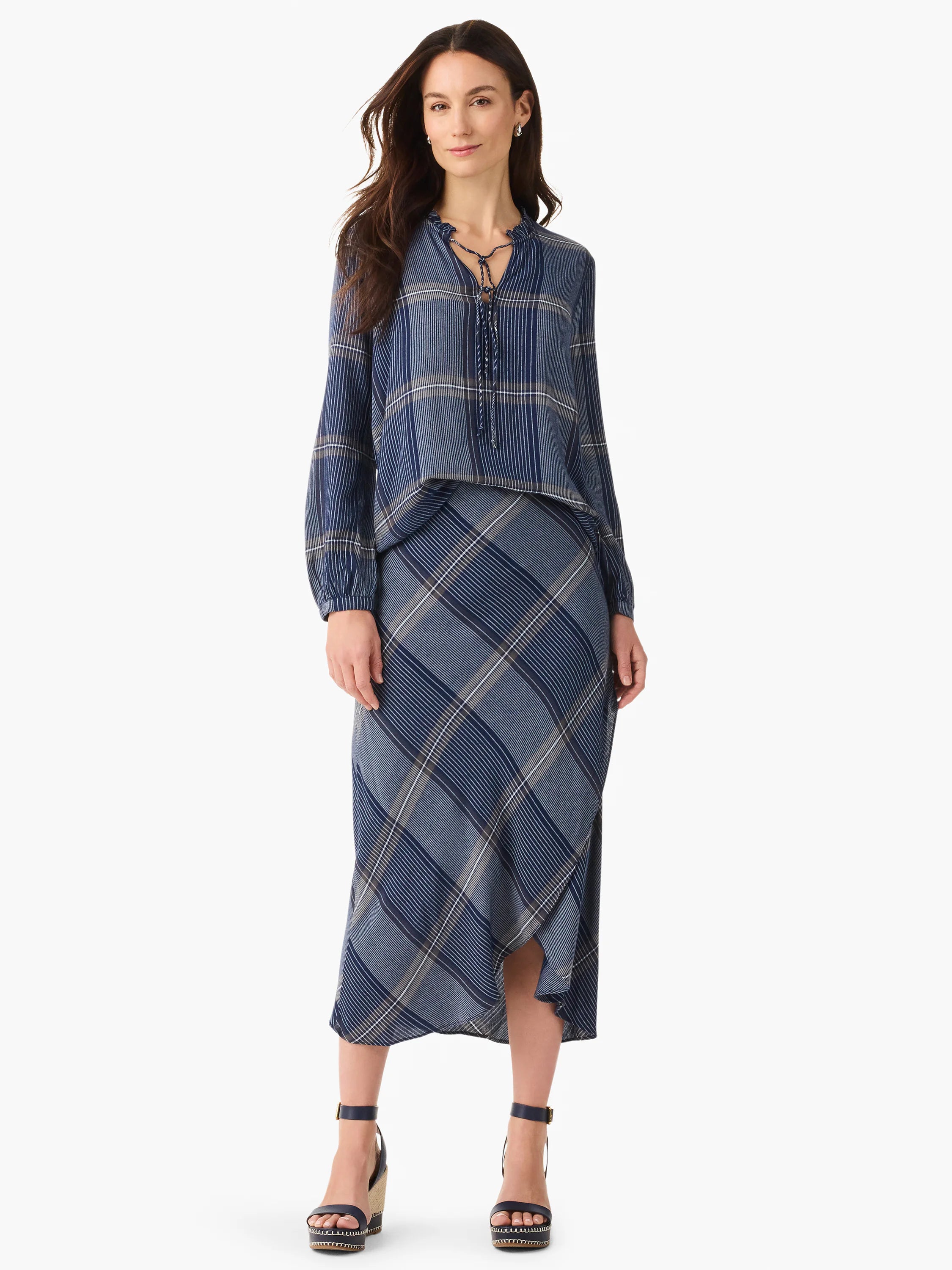 Blue and beige plaid top and asymmetrical midi skirt.  The top has a tie neckline.