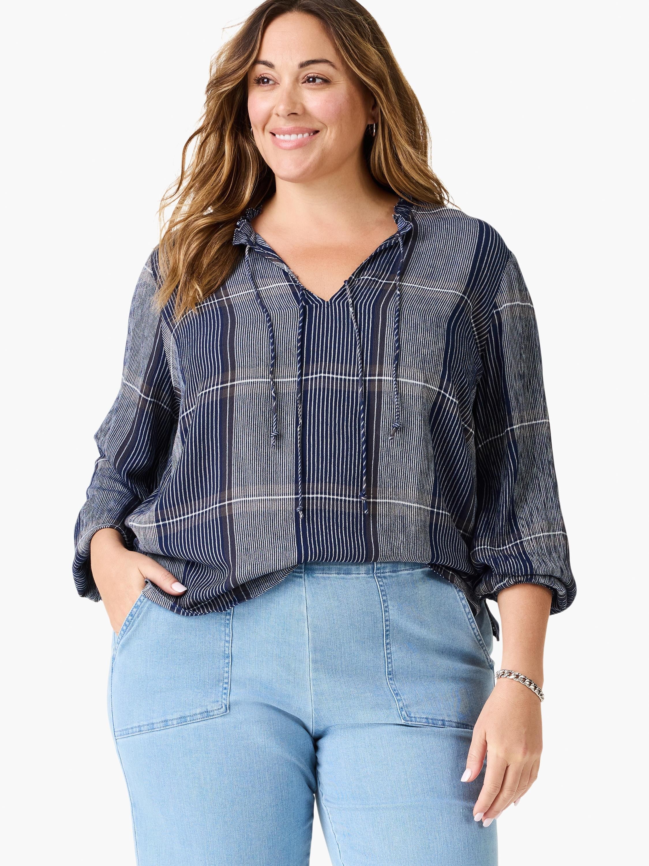 Navy blue and white plaid top with a V-neck and drawstring detail.  Long sleeves.