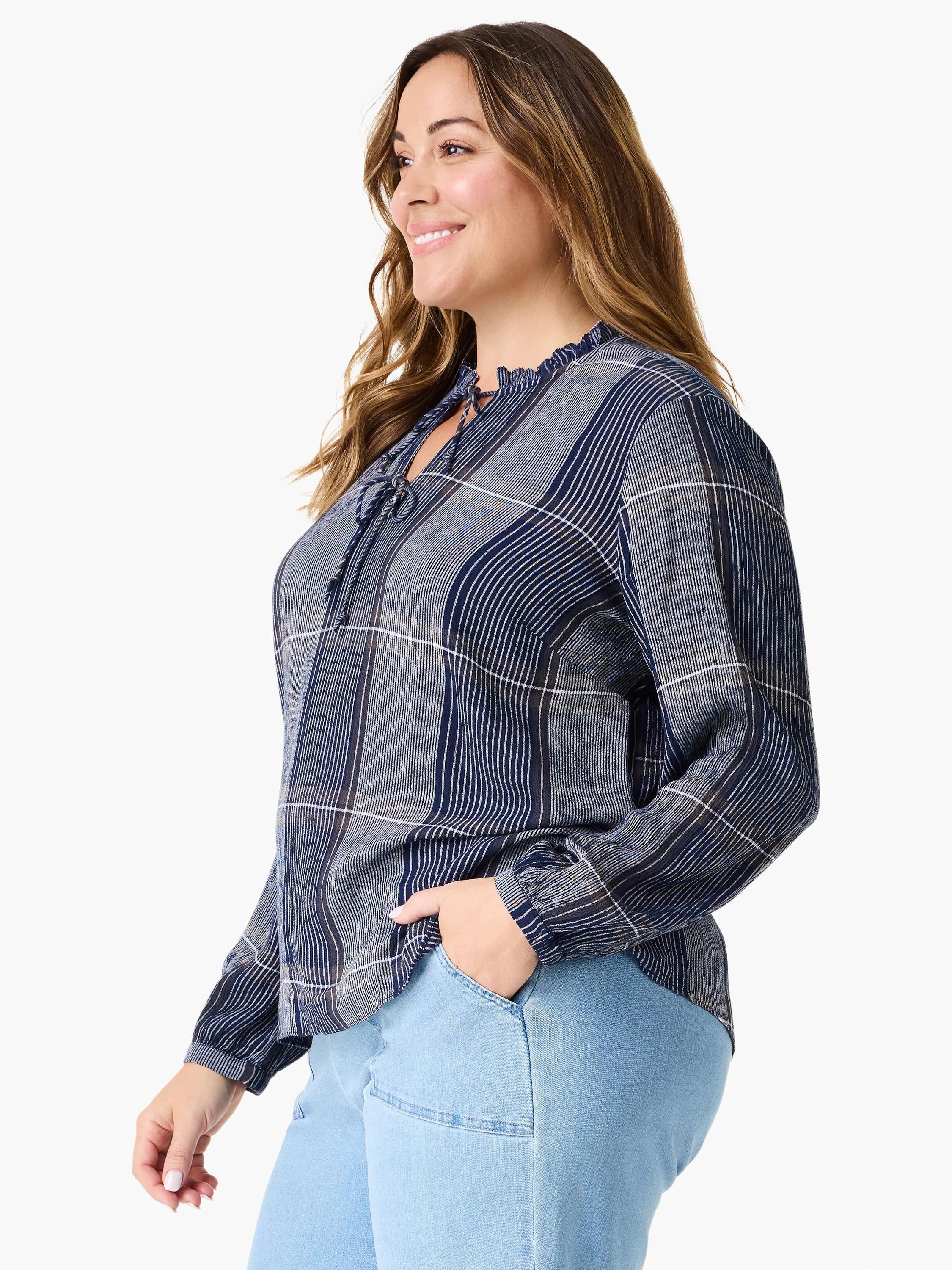 Navy blue and white striped long-sleeved blouse with a ruffled neckline and tie.  The shirt is semi-sheer.