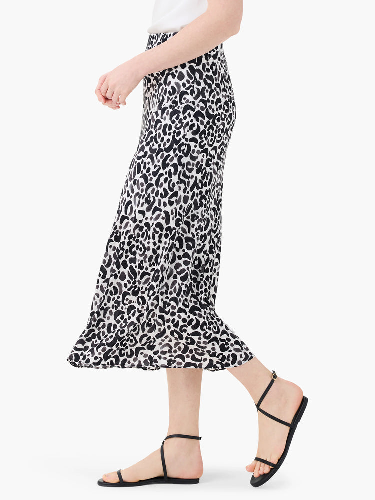 Mid-length slip skirt; off-white background with black and gray leopard print.