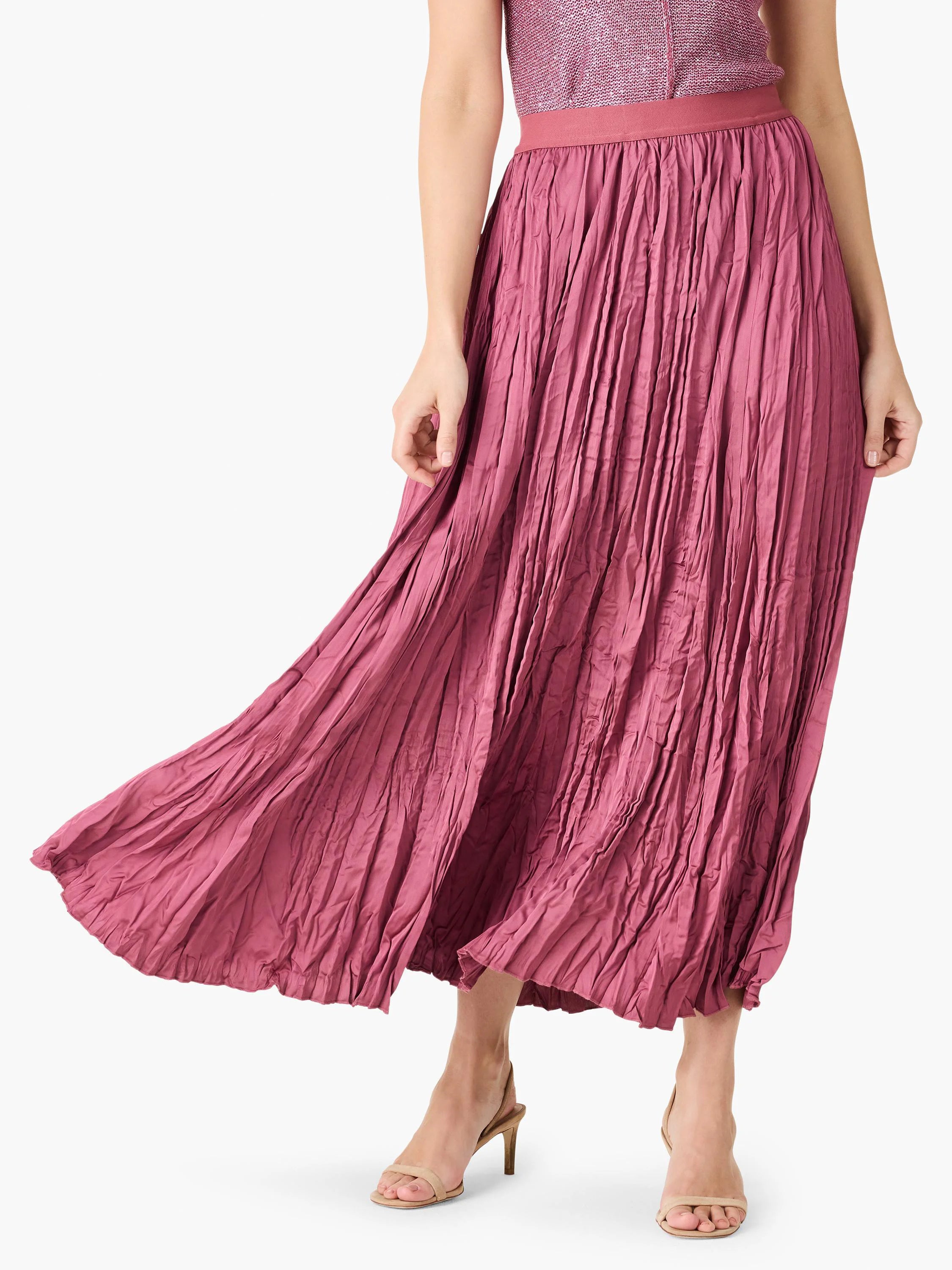 Deep pink, floor-length skirt with a crinkled, crushed texture and a smooth waistband.