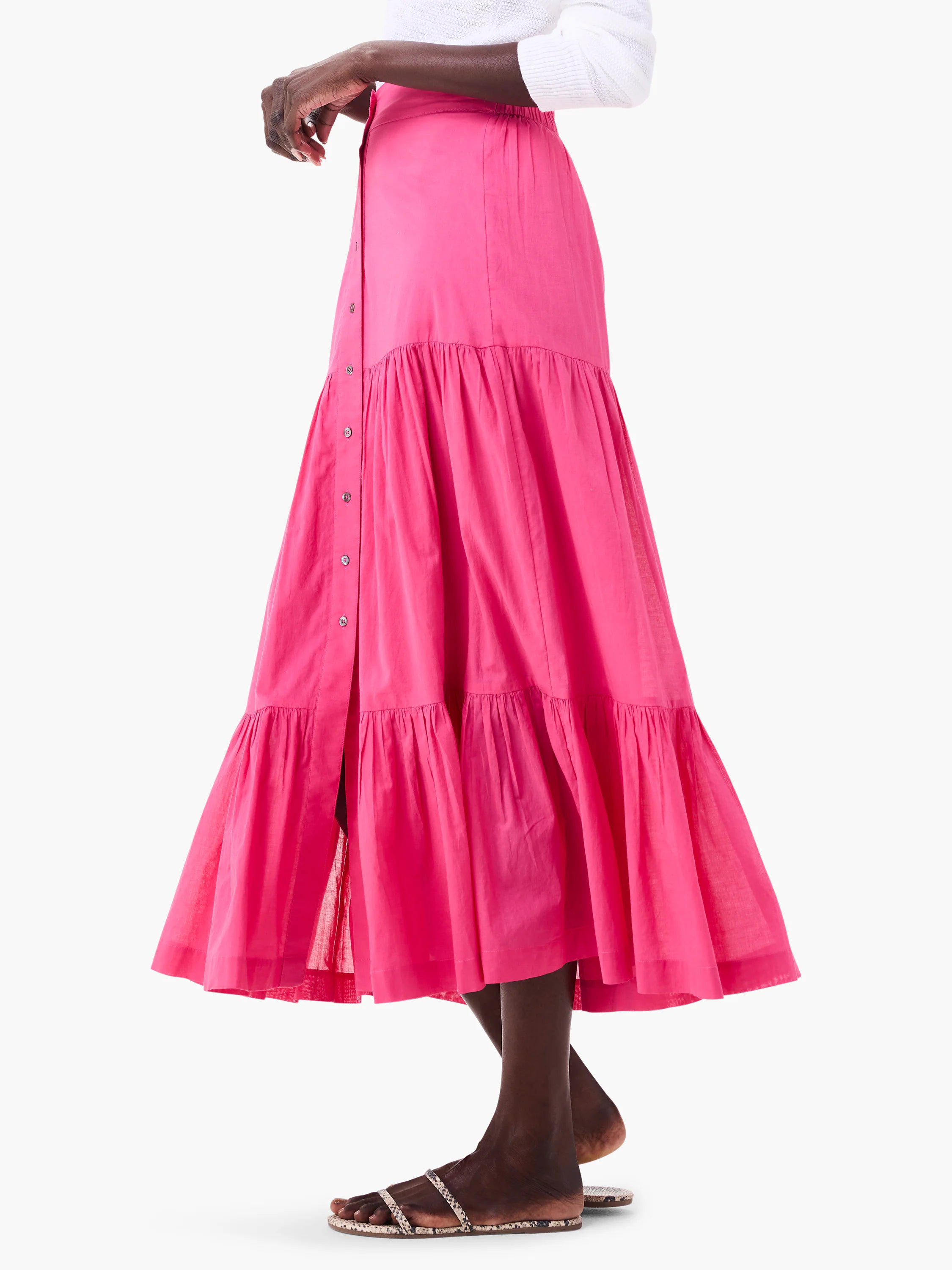 Hot pink tiered cotton midi skirt with a front button placket.