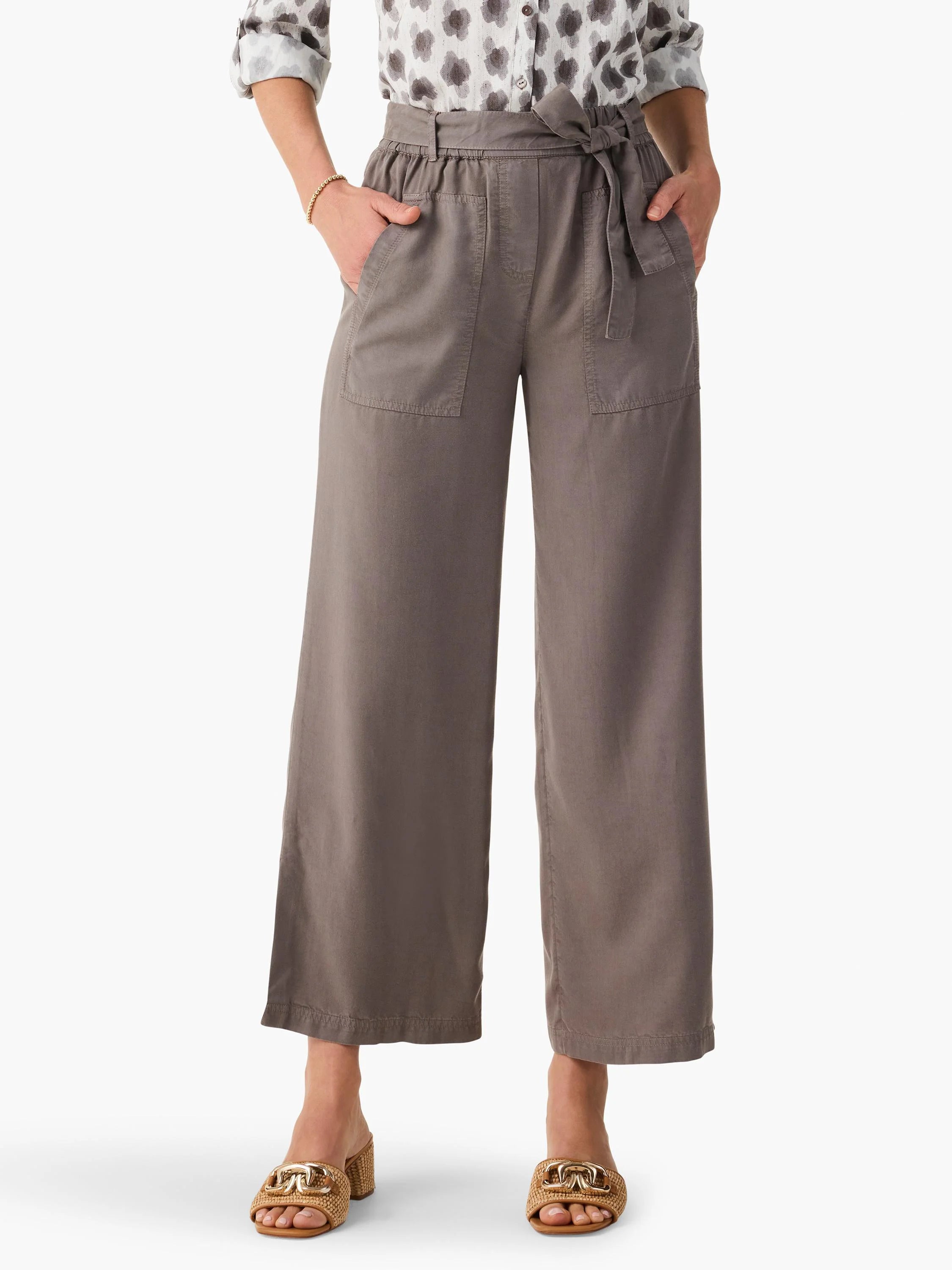 Drapey taupe wide-leg utility pants, elasticized waist with self-tie, and front patch pockets. Cropped above the ankle.