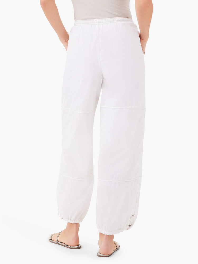 Here's alt text for the image, suitable for visually impaired users:

"White ankle-length pants with an elasticated...