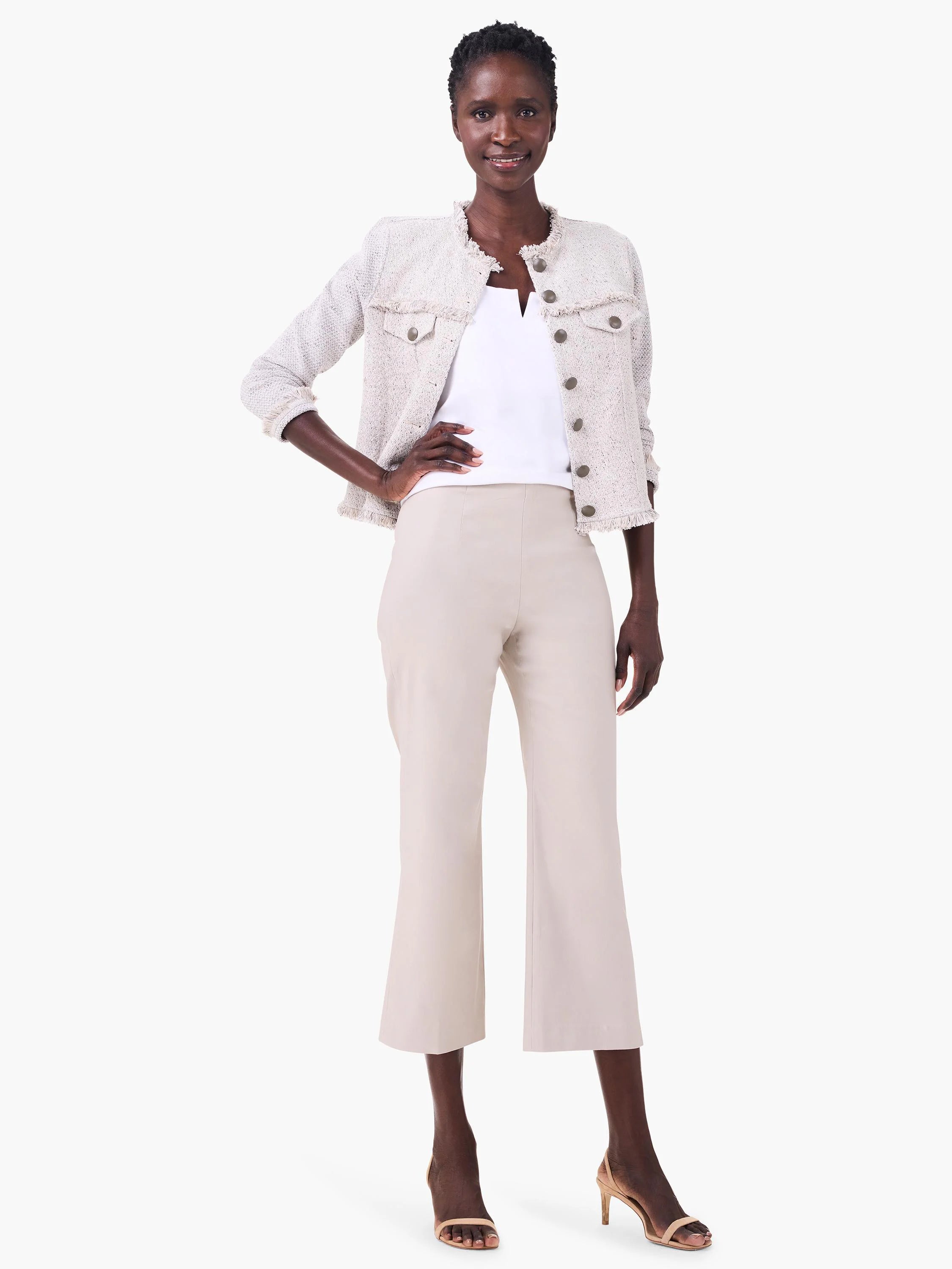 Light beige wide-leg crop pants with a smooth finish, featuring vertical seams and hitting above the ankle.