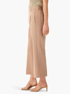 Here's alt text under 125 characters:

Light brown wide-leg cropped trousers;  straight,  ankle-length.  Side view.