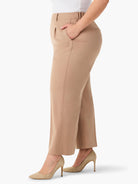 Beige wide-leg cropped trousers; side view showing pockets and center crease.