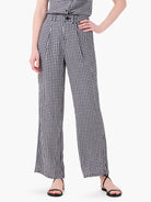 Black and white gingham wide-leg pants.  A model is wearing them.