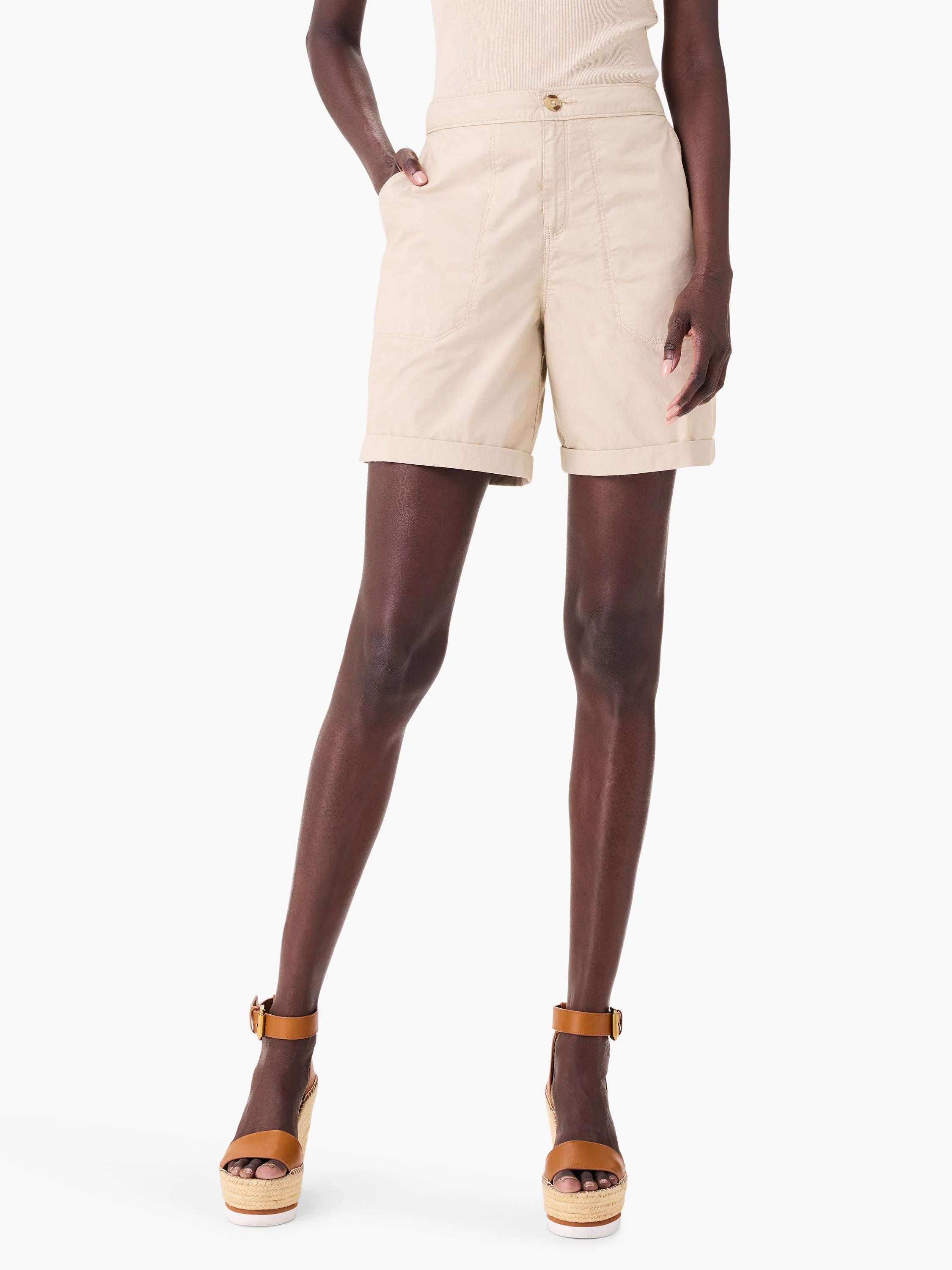 Beige poplin shorts; cuffed hems; model shown wearing tan sandals.
