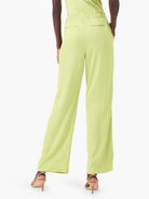 Here's alt text for the image, under 125 characters:

Light lime green wide-leg pants;  elastic waistband, back pockets. ...