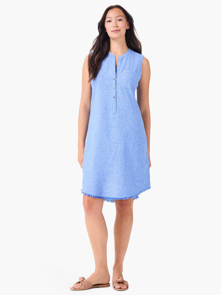 Light blue linen sleeveless midi dress with a button placket, small chest pocket, and raw hem.
