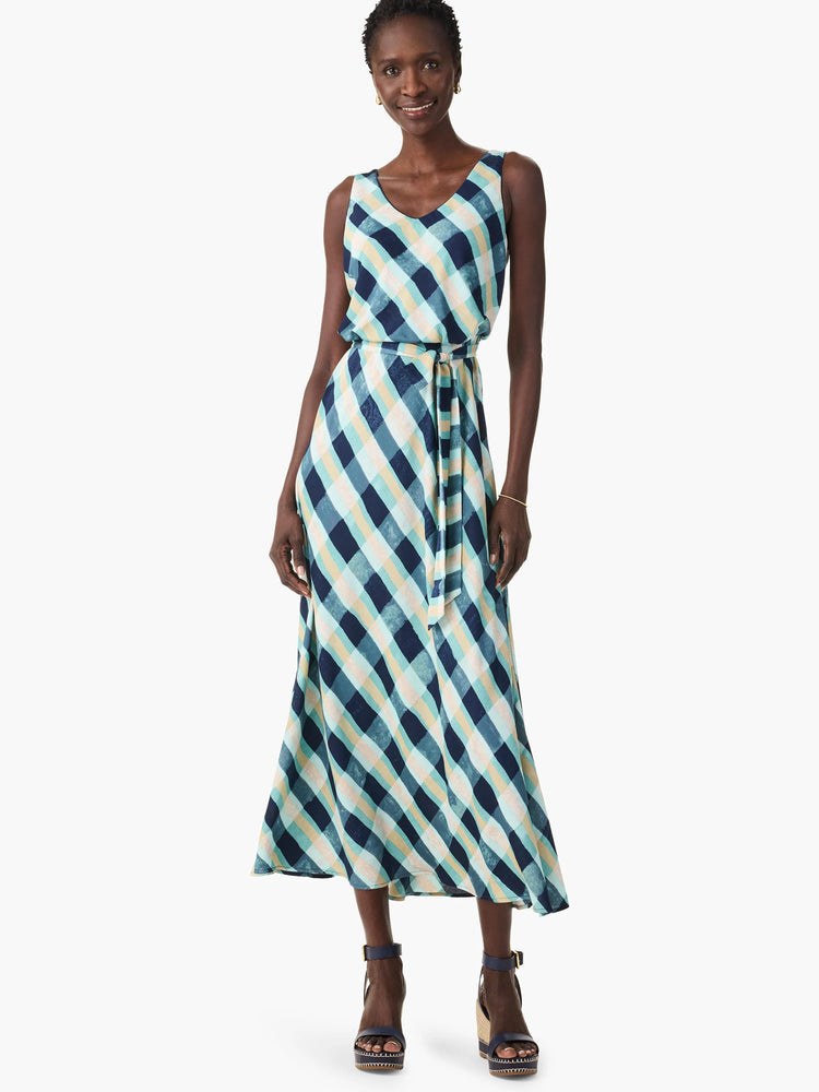 Midi dress, sleeveless, V-neck.  Diagonal plaid pattern in teal, navy, cream, and light mint.  Features a waist tie.