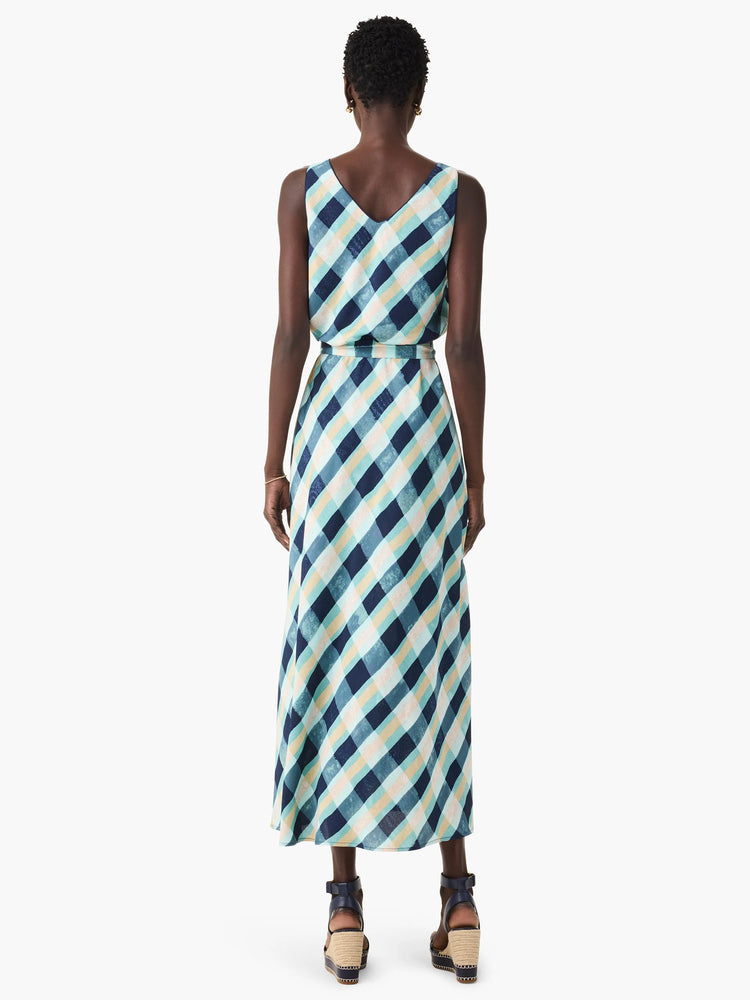 Maxi dress, sleeveless, V-neck.  Diagonal plaid in teal, navy, beige.  A-line silhouette.