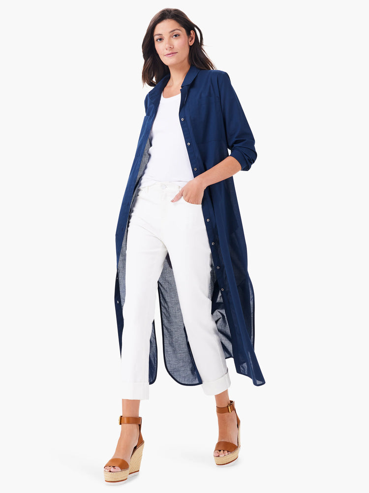 Navy blue, long-sleeved tunic shirt; collared, button-front.  Side slits.