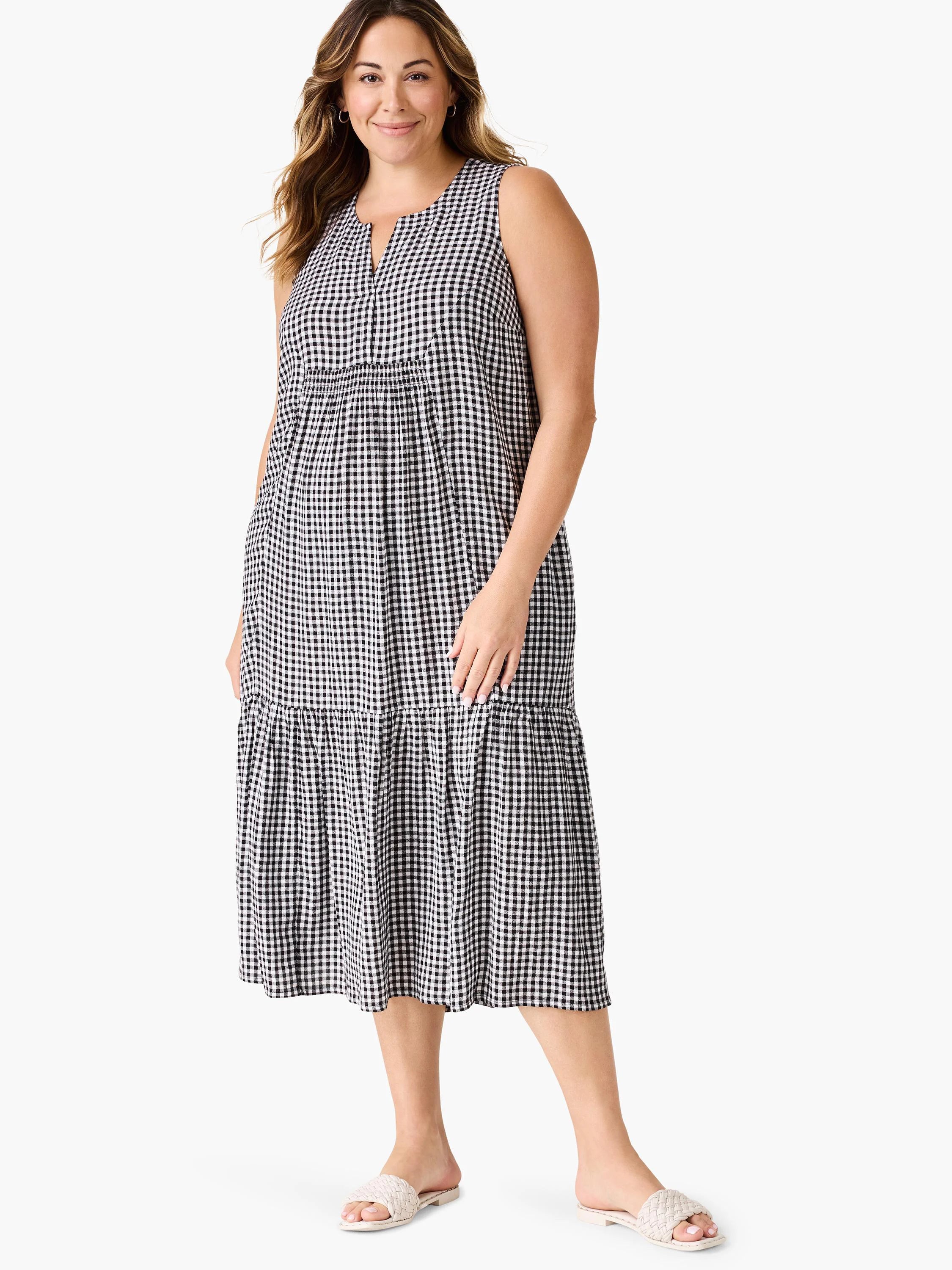 Black and white gingham midi dress; sleeveless, V-neck, tiered skirt.