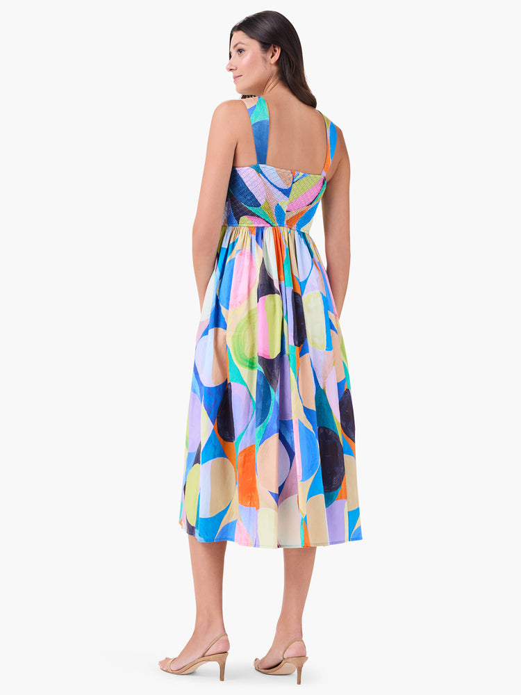 Midi dress, sleeveless,  square neckline.  Abstract print in blue, orange, pink, green, and beige.