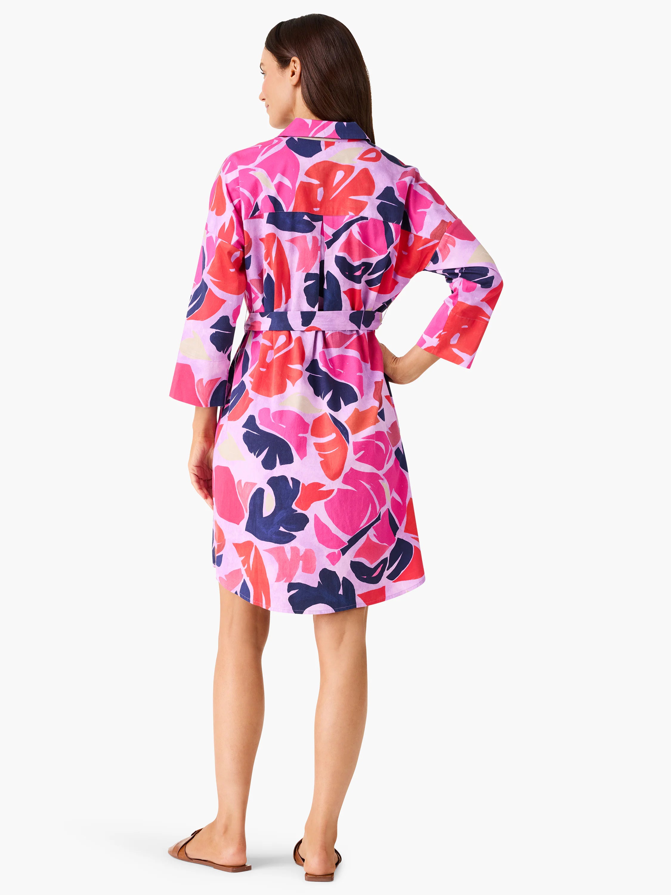 Purple shirt dress with pink, red, and navy leaf pattern.  Belted waist, 3/4 sleeves.
