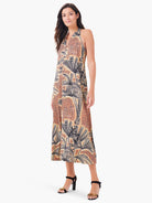 Midi halter dress, black, orange, and beige palm tree print. Sleeveless, A-line silhouette.